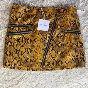 Yellow & Black Snakeskin mini skirt.